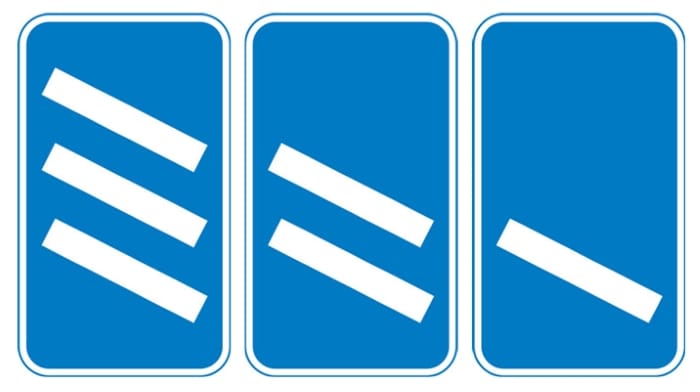 ‘Countdown’ markers at exit from motorway (each bar represents 100 yards to the exit). Green-backed markers may be used on primary routes and white-backed markers with black bars on other routes. At approaches to concealed level crossings white-backed markers with red bars may be used. Although these will be erected at equal distances the bars do not represent 100 yard intervals. - Image 1