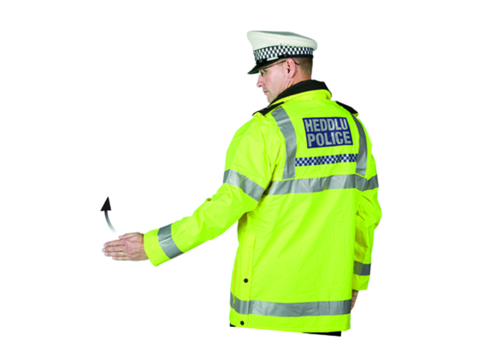 From behind*
*In Wales, bilingual signs appear on emergency services vehicles and clothing - Image 1